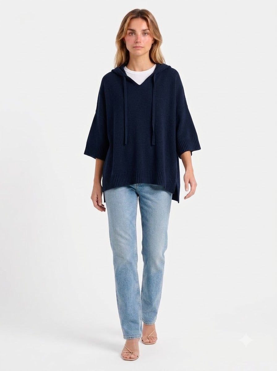 The-Elica Mirella Hooded Knit Poncho - Navy Blue - walking pose